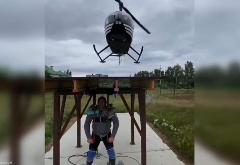(ویدئو) قویترین مرد روسیه یک هلیکوپتر را بلند کرد!
